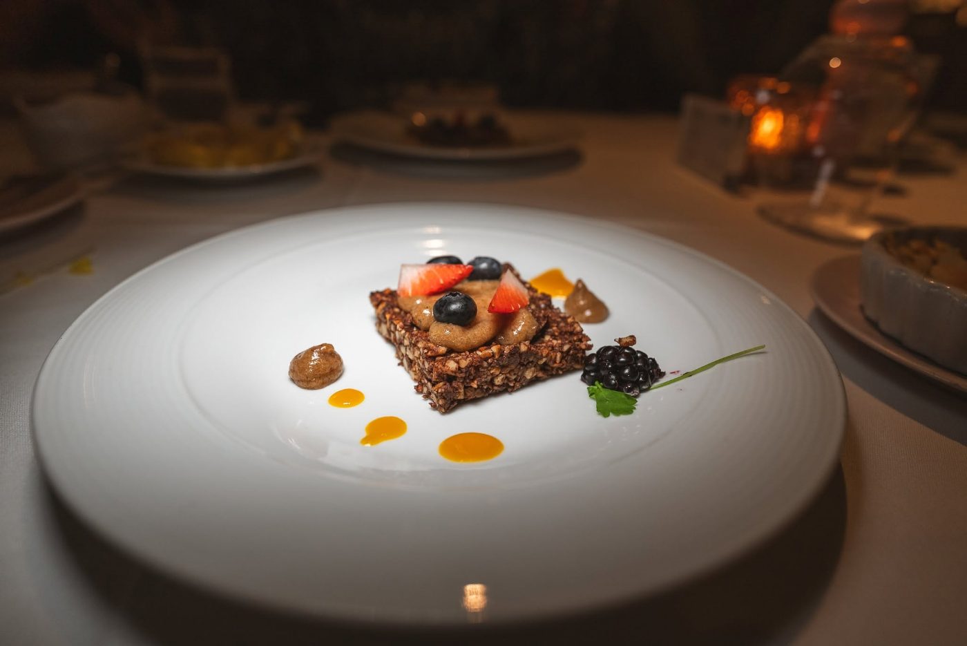 Nut bar served with fresh berries Nut bar served with fresh berries
