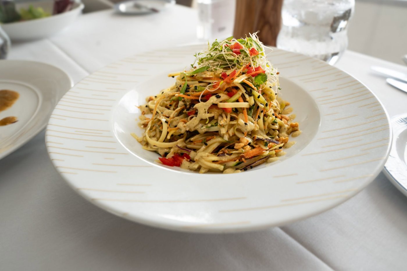 Raw vegetable noodles with cashew sauce Raw vegetable noodles with cashew sauce
