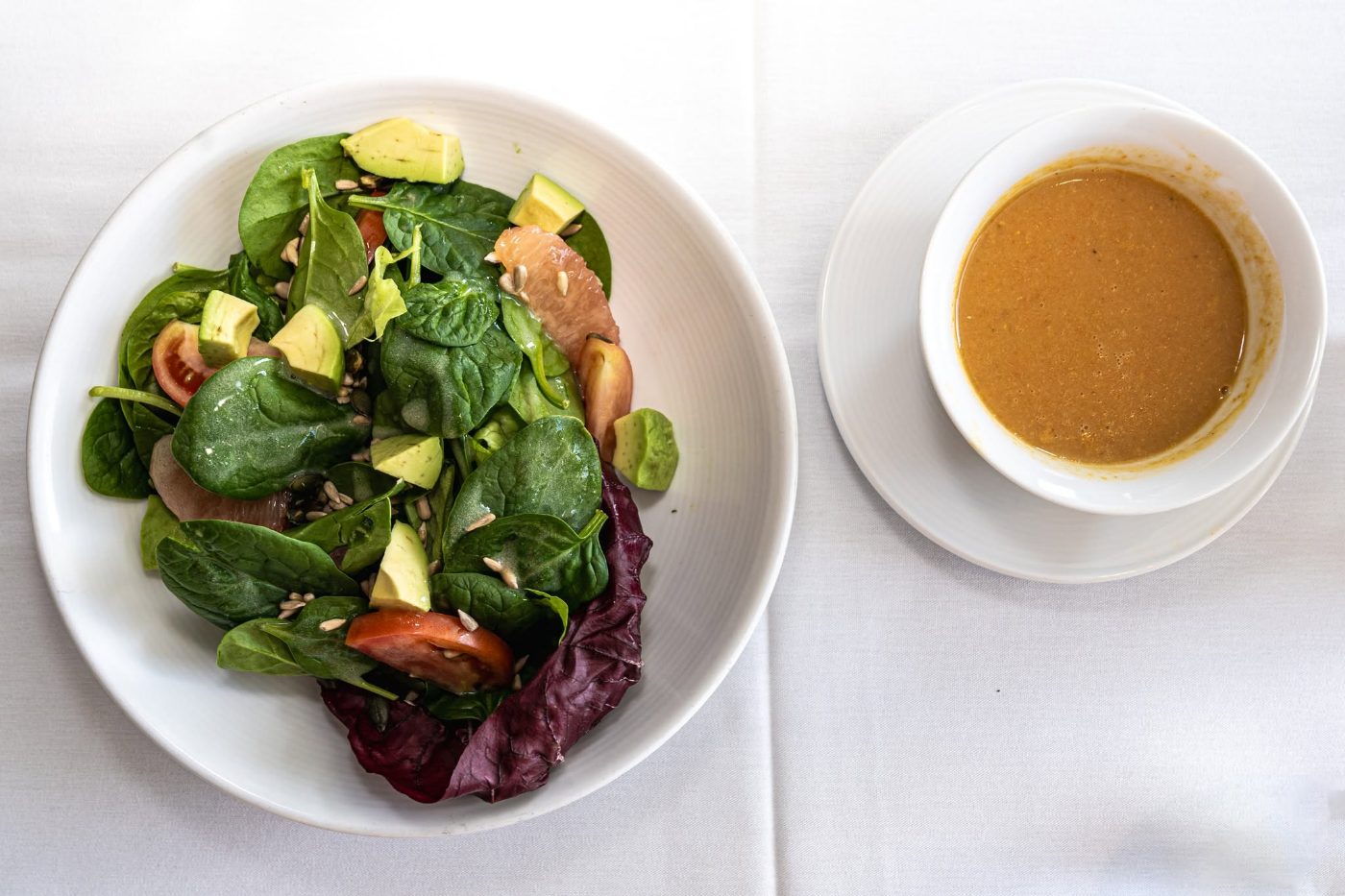 Spinach and avocado salad with house-made dressing Spinach and avocado salad with house-made dressing