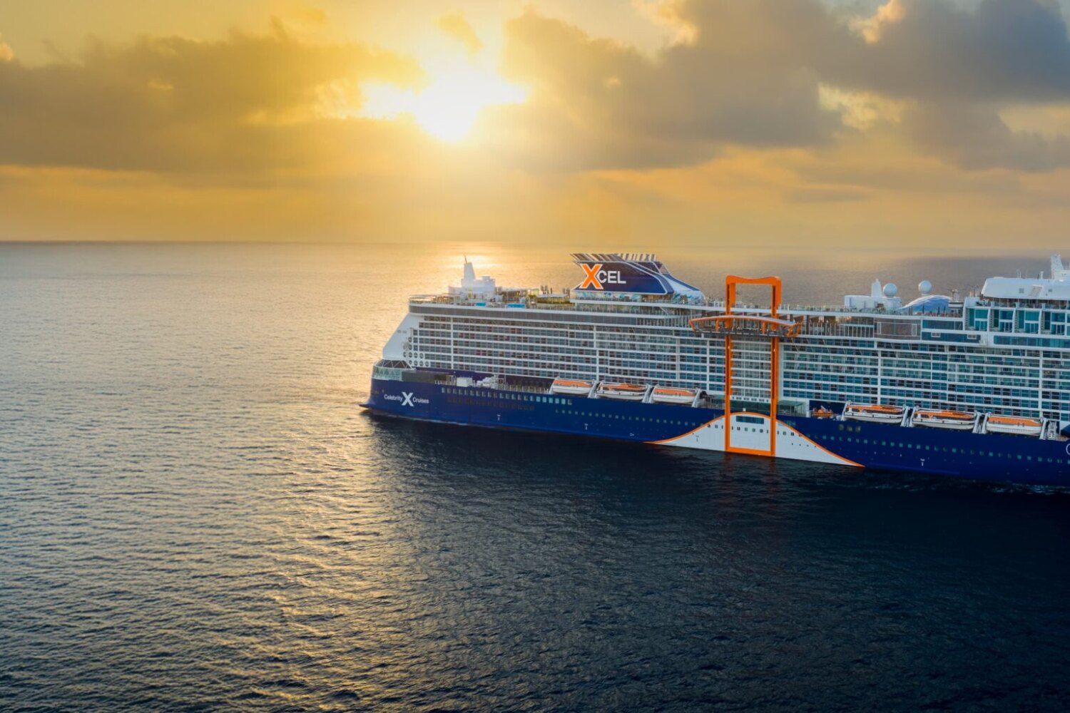 Celebrity Xcel at sea at sunset